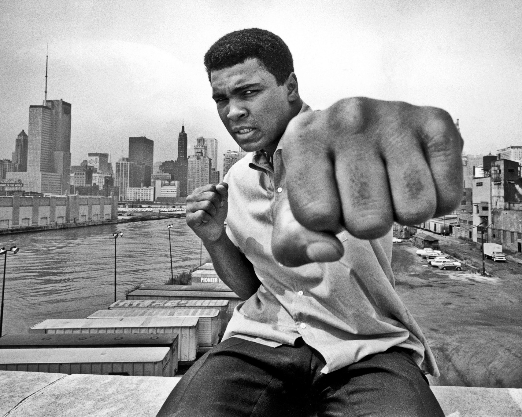 Muhammad Ali throwing a left jab toward the camera
